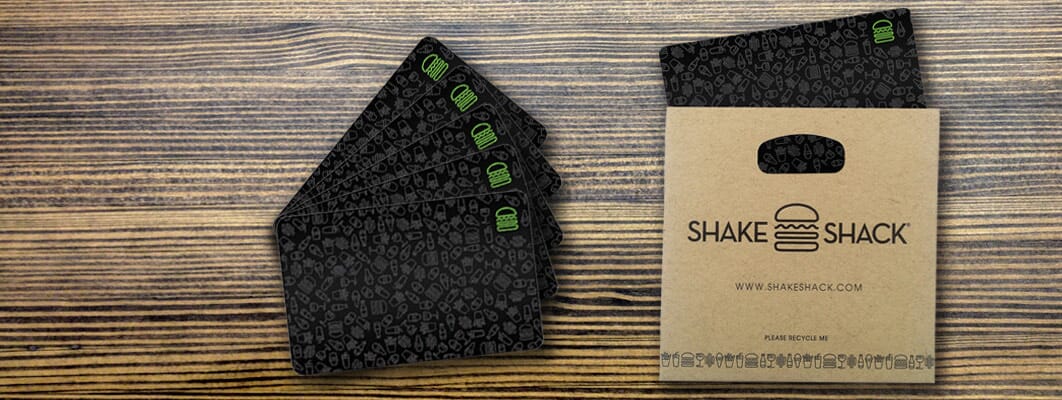 An Image Of Shake Shack Gift Cards Laid On A Table With Envelope